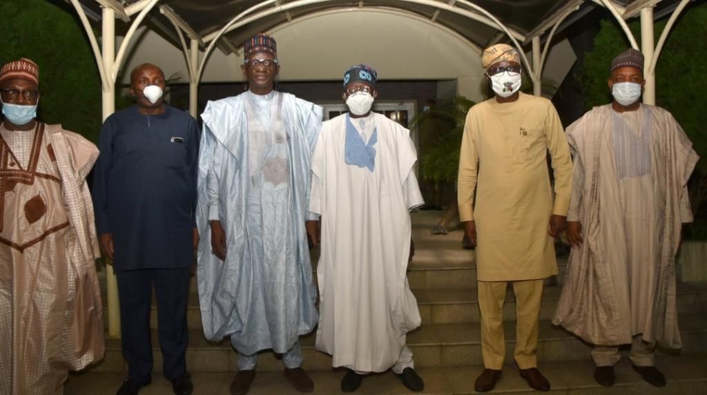 Tinubu with APC caretaker committee