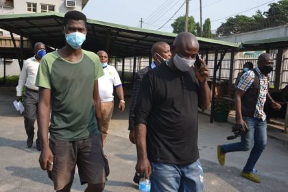 Vanger Luper (right) and Bright Ogbuagu during their arraignment for alleged adulteration of automobile engine lubricants by the Standards Organisation of Nigeria (SON) at the Federal High Court, Ikoyi Lagos, Wednesday