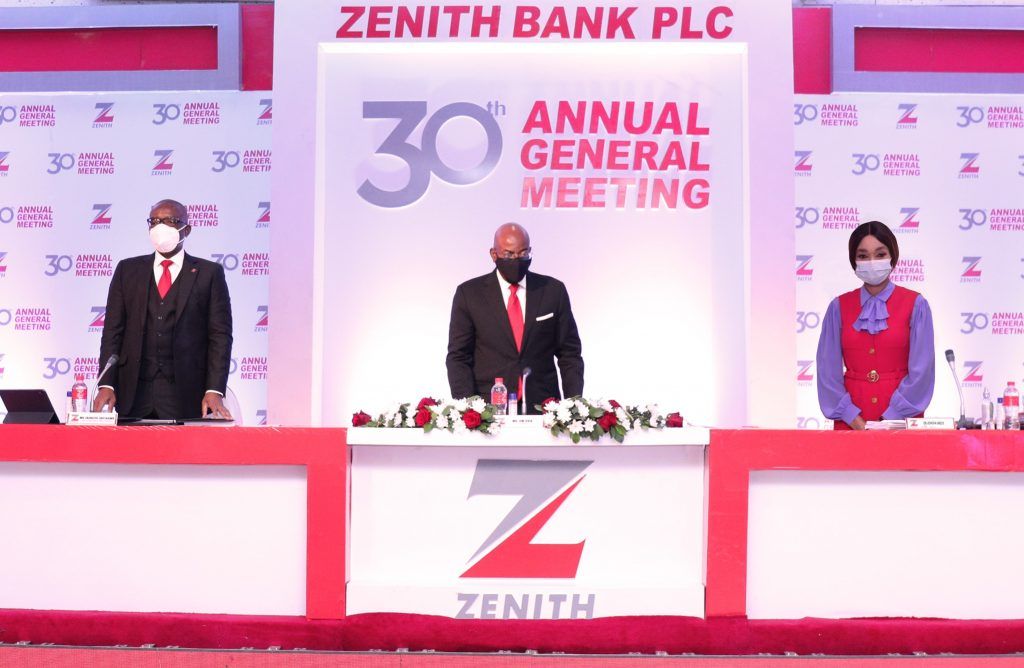 Chairman, Zenith Bank Plc, Mr. Jim Ovia (Centre) flanked by the Group Managing Director/ CEO, Mr. Ebenezer Onyeagwu (Left) and the Deputy Managing Director, Dame (Dr.) Adaora Umeoji (Right) at the 30th Annual General Meeting of the bank held at the Civic Centre, Victoria Island, Lagos on Tuesday, March 16, 2021.
