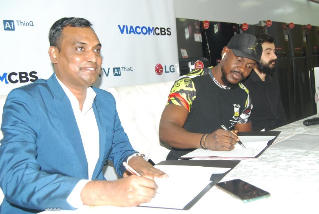PIX L-R: Head, Corporate Marketing, LG Electronics West Africa Operations, Mr. Hari Elluru, Country Manager, ViacomCBS, Mr. Bada Johnson and Head, Showroom Operations, Fouani Nigeria Limited, Mr. Souhad Achour at the official announcement of LG/VaicomCBC Media Advertising and Sponsorship deal held at LG Showroom, Lekki Lagos Nigeria, today.