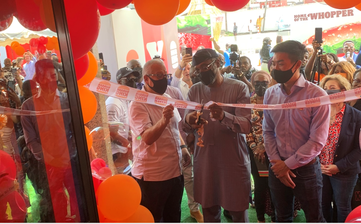 L-R: Burger King Area Franchise Lead for Sub-Saharan Africa, Almu Miguel-Romero; Speaker of the House of Representatives, Honorable Femi Gbajabiamila; with Burger King General Manager for UK, Middle East, and Africa, Robert Lu; during the grand opening of Burger King flagship outlet in Nigeria