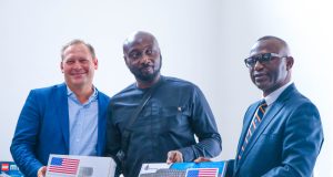 L-R: U.S. Consulate Public Affairs Officer Stephen Ibelli, Head of Station at Wazobia 95.1 FM, Uche Nwaneri; with Executive Director, West Africa Broadcast and Media Academy, Jika Attoh, during the presentation of equipment to radio stations participating in the "Project Fact Check Nigeria" supported by the U.S. Consulate General in Lagos on Monday.