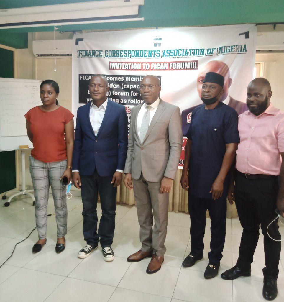 Johnson Chukwu (M) with FICAN executives