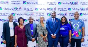 L – R: Onyeka Kurume, Team Lead, Retail Bank, Fidelity Bank Plc; Genevieve Nwaoche, representative of the National Lottery Regulatory Commission (NLRC); Ukpai Ibe, Head, Savings and Sales, Fidelity Bank Plc; Oyinkan Kusamotu, Senior Legal Officer, Lagos State Lotteries & Gaming Authority; Meksley Nwagboh, Divisional Head, Brands and Communications, Fidelity Bank Plc; Uche Obodoekwe, Group Head, Property, Procurement & Vendor Management, Fidelity Bank Plc; and Osita Ede, Divisional Head, Product Development, Fidelity Bank Plc at the third monthly draw of the Get Alert in Millions Season 5 (GAIM 5) Savings Promo held in Lagos on Tuesday.