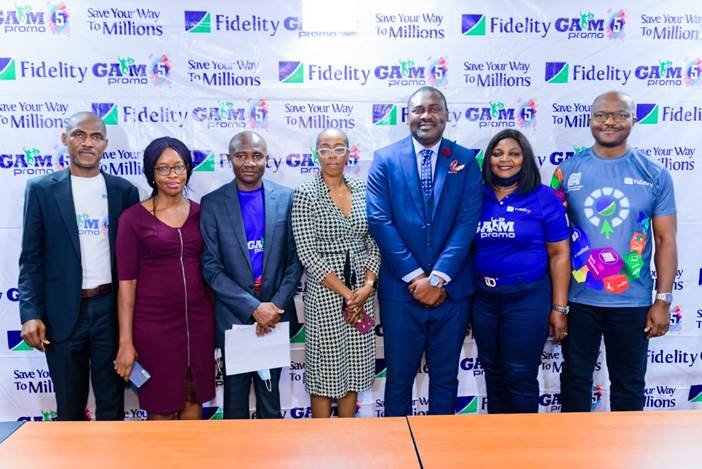 L – R: Onyeka Kurume, Team Lead, Retail Bank, Fidelity Bank Plc; Genevieve Nwaoche, representative of the National Lottery Regulatory Commission (NLRC); Ukpai Ibe, Head, Savings and Sales, Fidelity Bank Plc; Oyinkan Kusamotu, Senior Legal Officer, Lagos State Lotteries & Gaming Authority; Meksley Nwagboh, Divisional Head, Brands and Communications, Fidelity Bank Plc; Uche Obodoekwe, Group Head, Property, Procurement & Vendor Management, Fidelity Bank Plc; and Osita Ede, Divisional Head, Product Development, Fidelity Bank Plc at the third monthly draw of the Get Alert in Millions Season 5 (GAIM 5) Savings Promo held in Lagos on Tuesday.