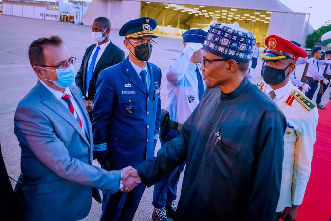Buhari in Portugal, restates commitment to peaceful conduct of 2023 election