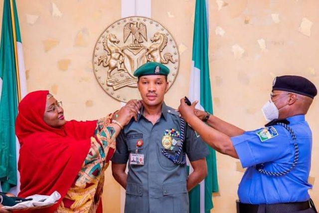 Aisha, Buhari's wife, decorates Police ADC with new rank