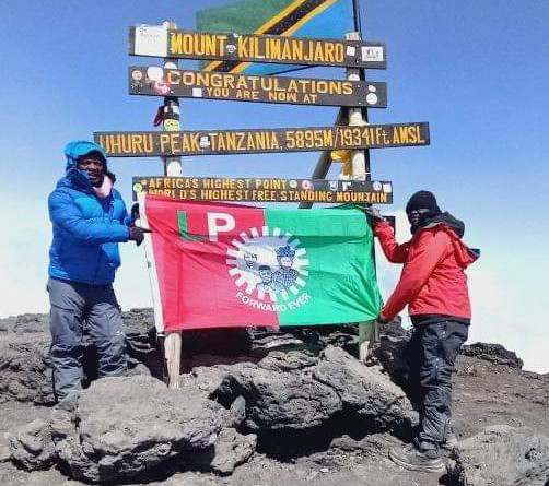 Peter Obi's supporter climbs Mount Kilimanjaro to hang Labour Party's flag