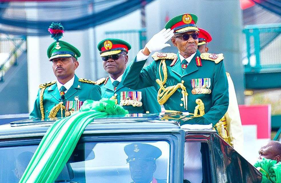 Buhari arrives army parade in military outfit
