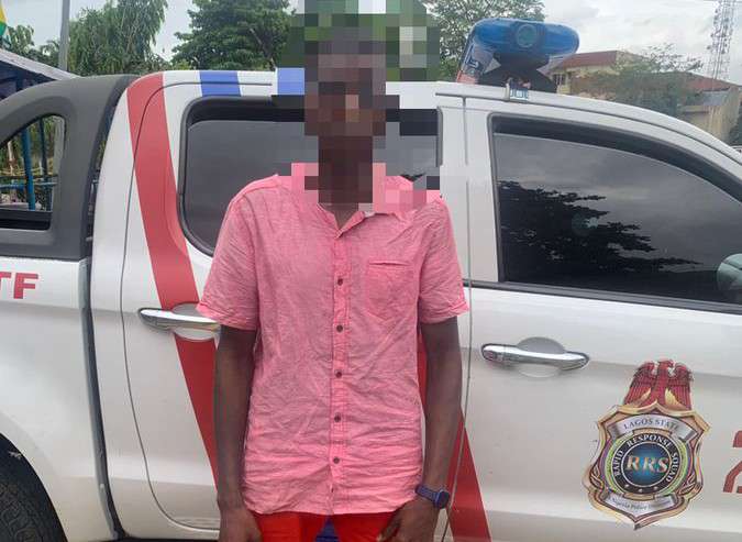 Lagos police stop street hawker from jumping into the lagoon