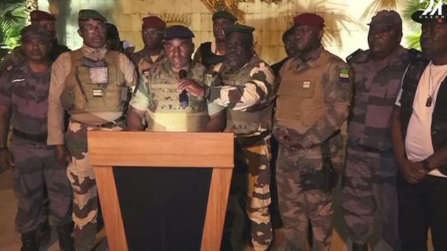 'We're finally on the road to happiness,' Gabon military officers declare as they oust Bongo
