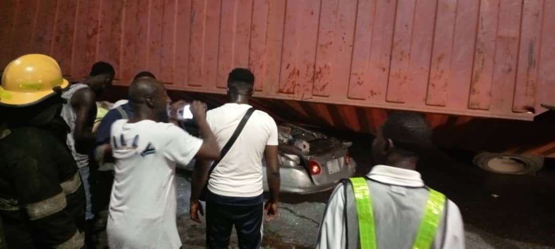 Three escape death as container truck crushes car in Lagos