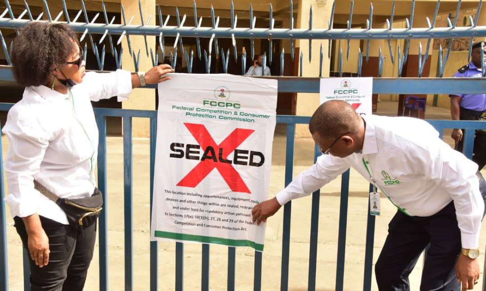 'They're looking for scapegoats' Nigerians express shock as FG seals off Abuja store over 'high cost of goods'