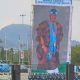 National Troupe unveils world largest canvass painting portrait of Tinubu