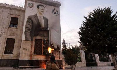 Syrian rebels march into Damascus, declare declares victory over Bashar al-Assad