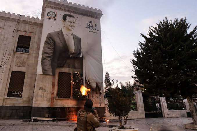 Syrian rebels march into Damascus, declare declares victory over Bashar al-Assad