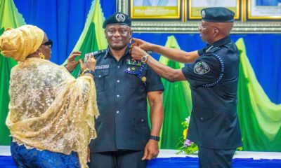 Egbetokun decorates Disu with AIG Rank