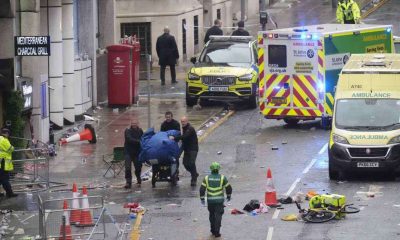 Man arrested after car hits crowd during Liverpool victory parade