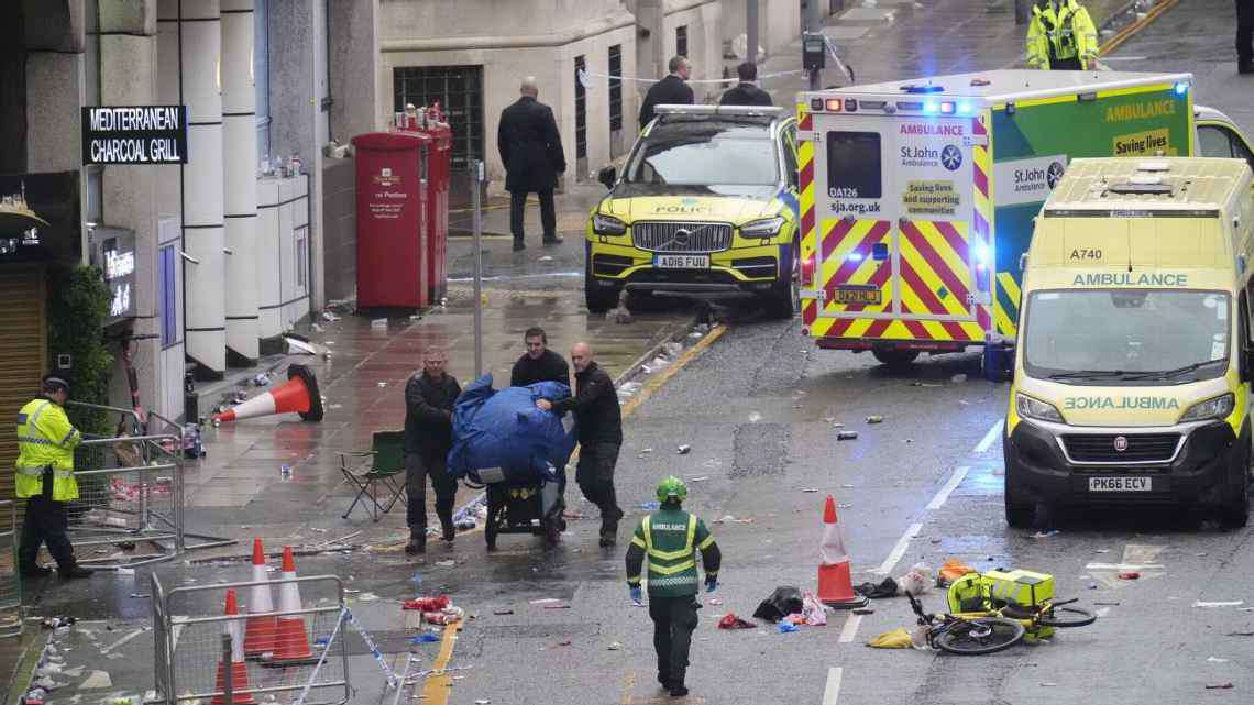 Man arrested after car hits crowd during Liverpool victory parade