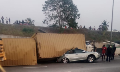 Man dies, wife injured as truck topples onto car in Lagos