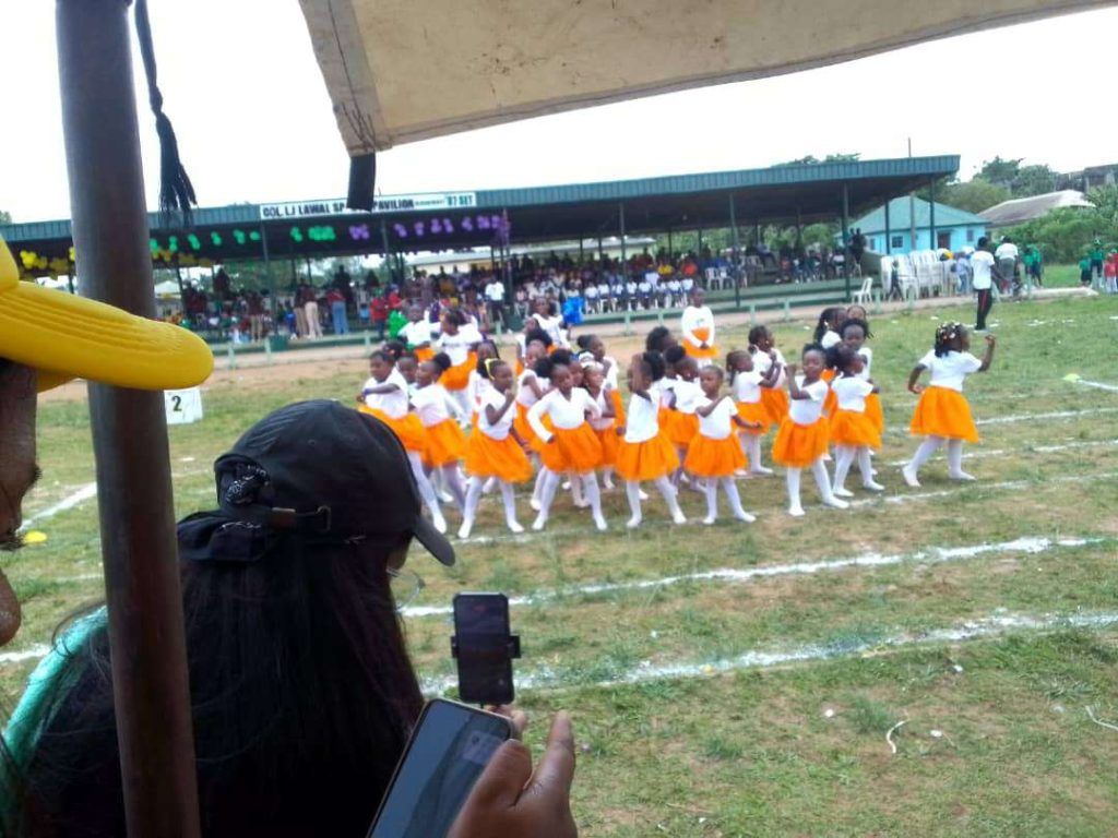 At the first Ruthwiphdale inter sports, yellow house shines